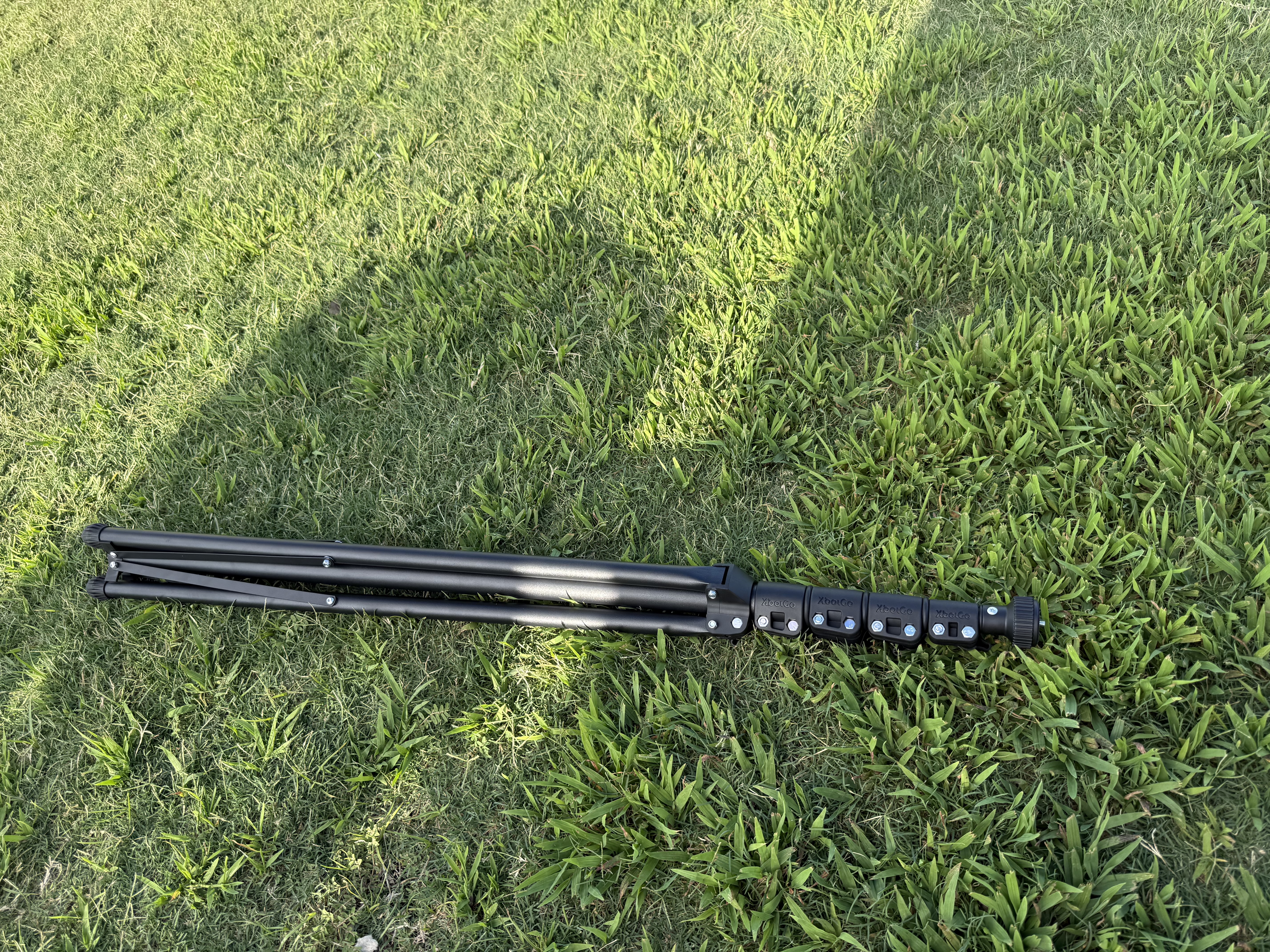 XbotGo tripod on grass